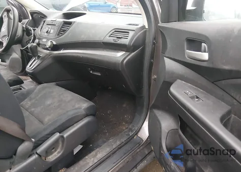 2015 Honda Cr-V Lx z USA, uszkodzony, nr VIN 2HKRM4H39FH632864